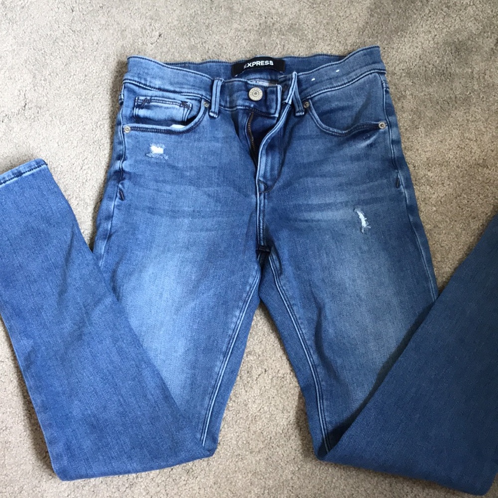 Express lightly distressed jeggings.